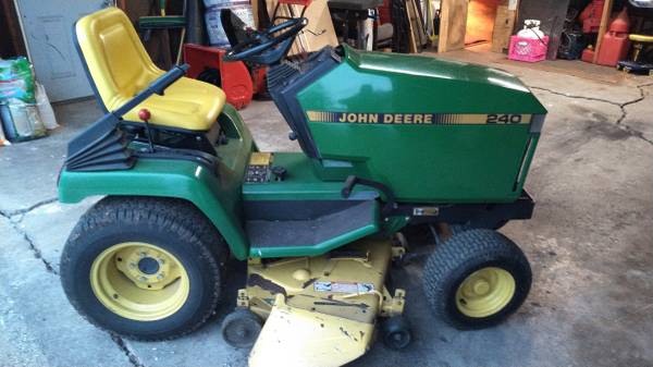 John Deere 240 1 Used John Deere 240 lawn mower with blower
