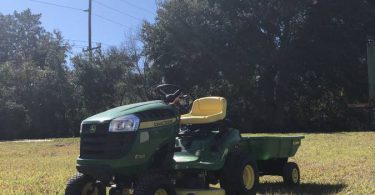 John Deere E110 1 375x195 John Deere E110 19 HP 42 Riding Lawn Mower with Trailer for Sale