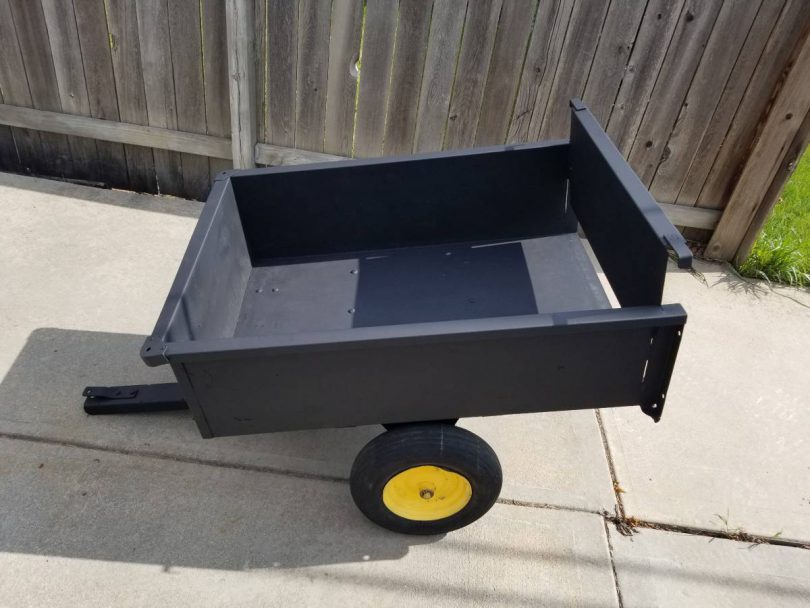 pull behind dumpling trailer 2 810x608 Pulls behind a riding mower dump cart trailer