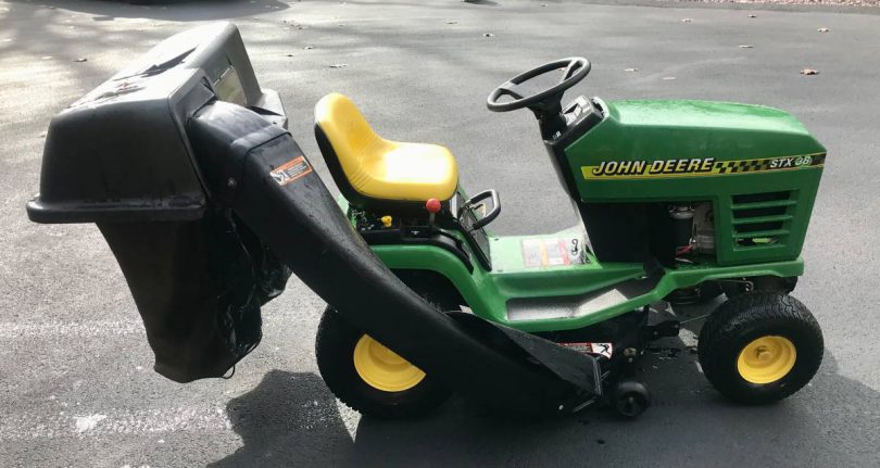 00W0W 7azvMzachEtz 0CI0kA 1200x900 810x431 John Deere STX38 Riding Lawn Mower With Double Bagging System