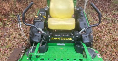 00z0z 6rmRP5bWKaZ 0t20CI 1200x900 375x195 Used John Deere Z915E Commercial Zero Turn Lawn Mower   54 Deck for Sale